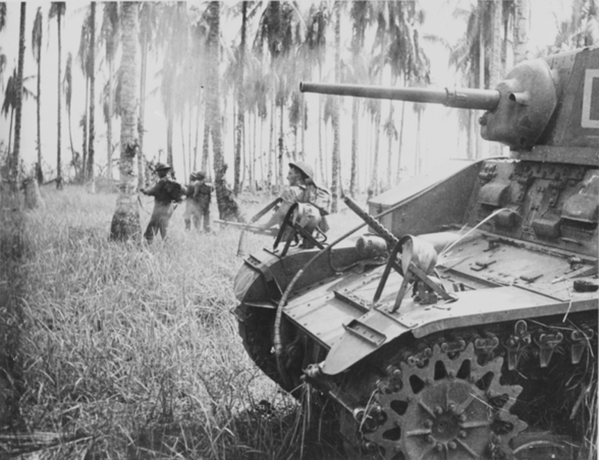 Black and white picture of Australian soldiers and a military tank in 1943