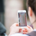 A person uses a smartphone