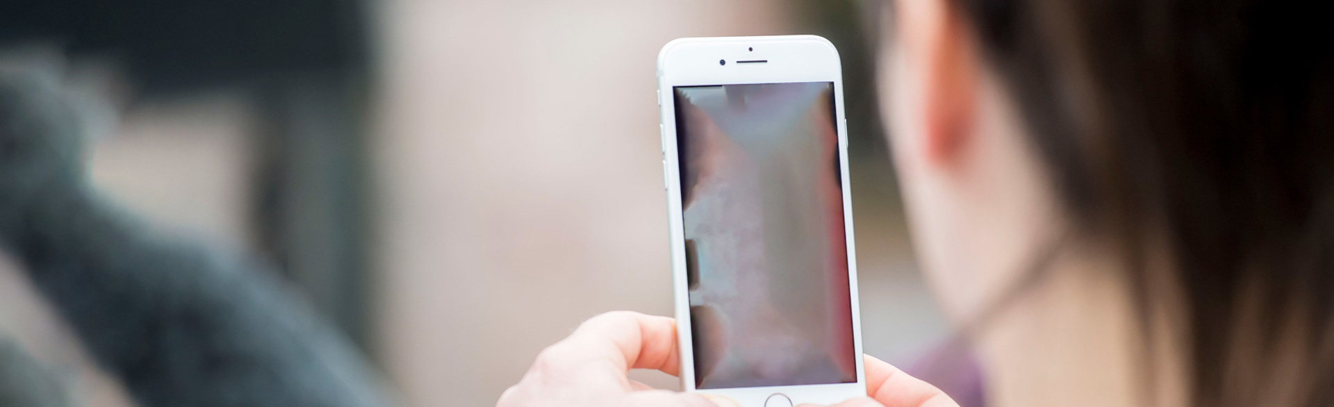 A person uses a smartphone