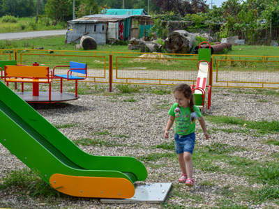 children playing by a slide in primorsky, abkhazia