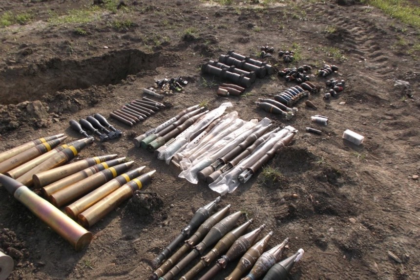 A collection of ammunitions lay on the ground