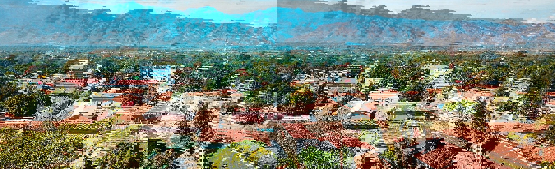 View of a Honduran city with mountains in the background