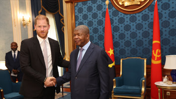The Duke of Sussex shaking hands with the president of Angola