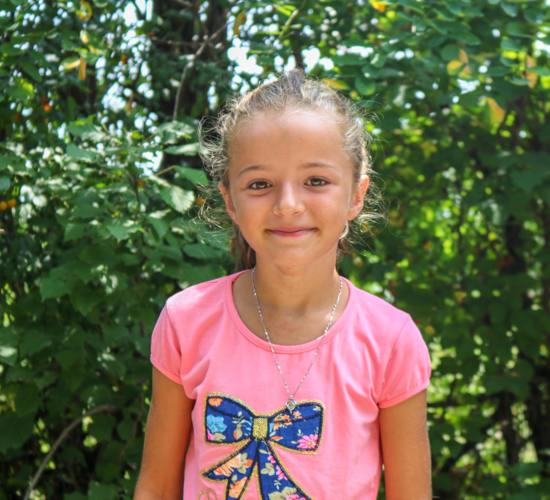 Kaltirina, a child on her way to school in Kosovo