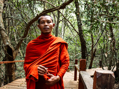 A monk leading the Community Forest project